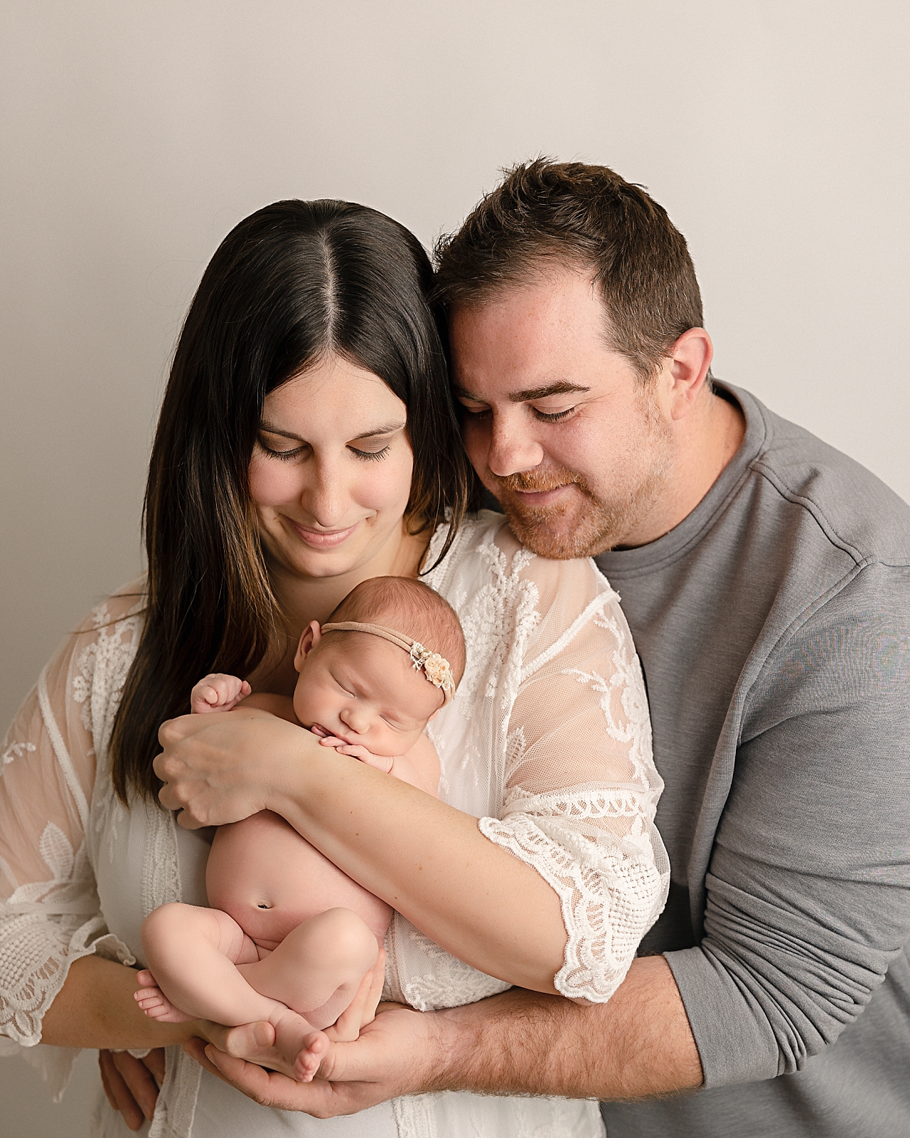 newborn baby girl being held by her parents Ready Set Grow Portland